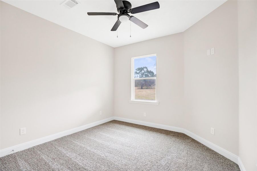 Bedroom #3 located downstairs