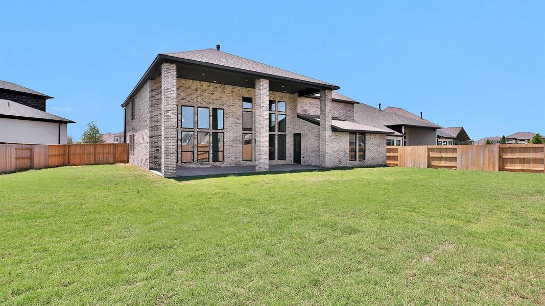 Exterior details and patio area of a home in Elyson, Katy (Image 3).