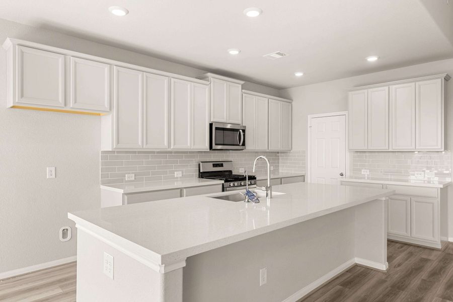 Kitchen. Note: Sample product photo - actual exterior and interior selections may vary by homesite