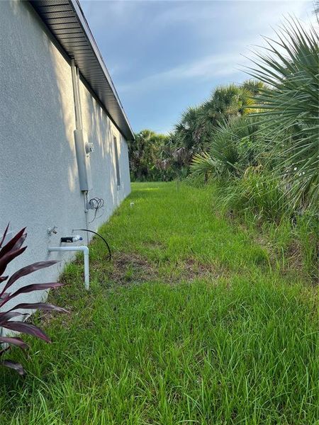 Front exterior of a new home in , Palm Bay, FL, highlighting curb appeal (Image 15). Front exterior of a new home in , Palm Bay, FL, highlighting curb appeal (Image 15).