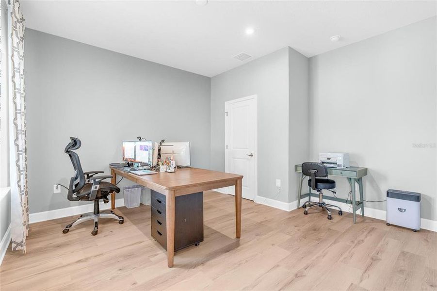Furnished interior view inside a new home in Bella Terra, Clermont (Image 63).