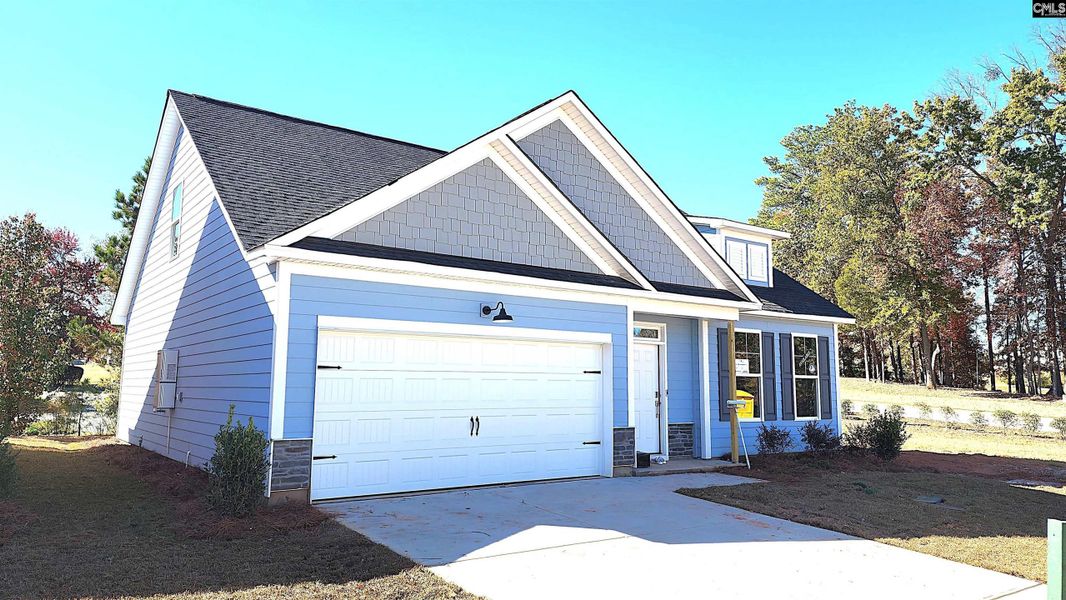 Front exterior of a new home in Bickley Station, Irmo, SC, highlighting curb appeal (Image 2). Front exterior of a new home in Bickley Station, Irmo, SC, highlighting curb appeal (Image 2).