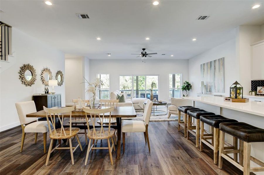 Open concept with plenty of available seating with the dining area and breakfast bar on the island!