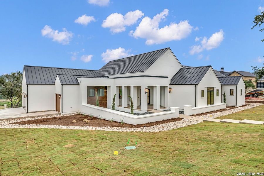 Exterior details and patio area of a home in , San Antonio (Image 32).