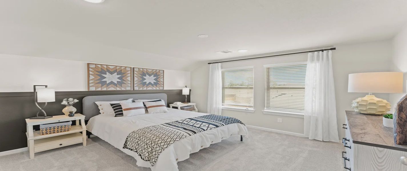 Representative furnished interior of a home built from the Hawkins by Chesmar Homes in Sienna Courtyard, Missouri City (Image 11).