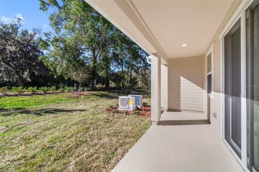 Exterior details and patio area of a home in Towns at Greenleaf, Oviedo (Image 3).