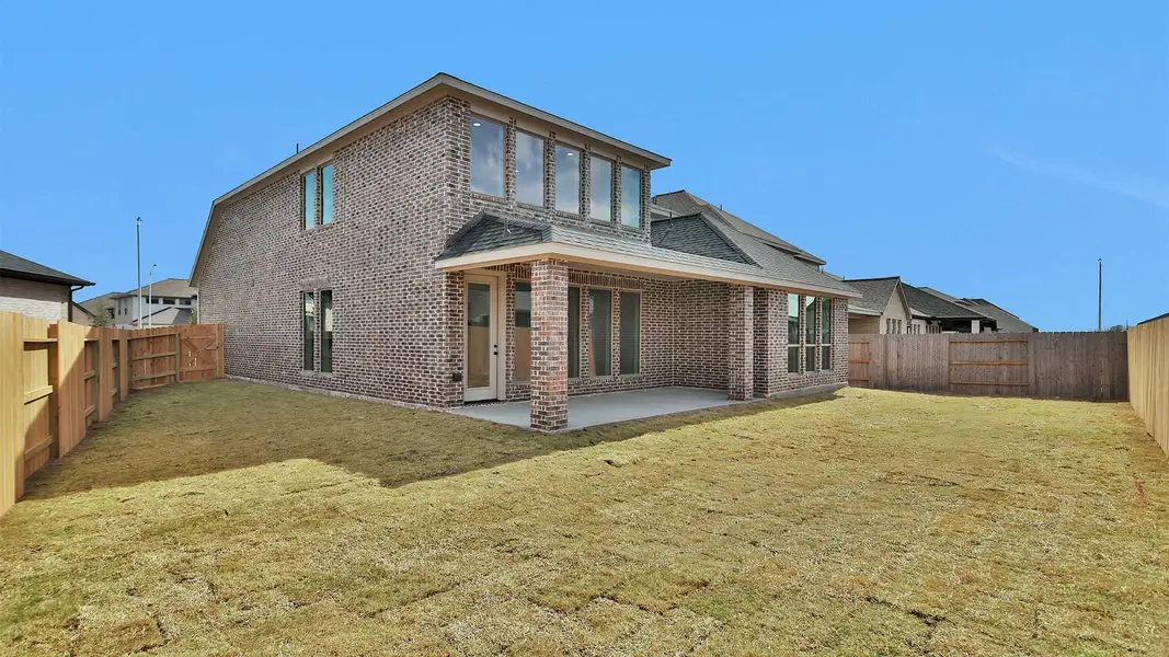 Exterior details and patio area of a home in StoneCreek Estates, Richmond (Image 3).