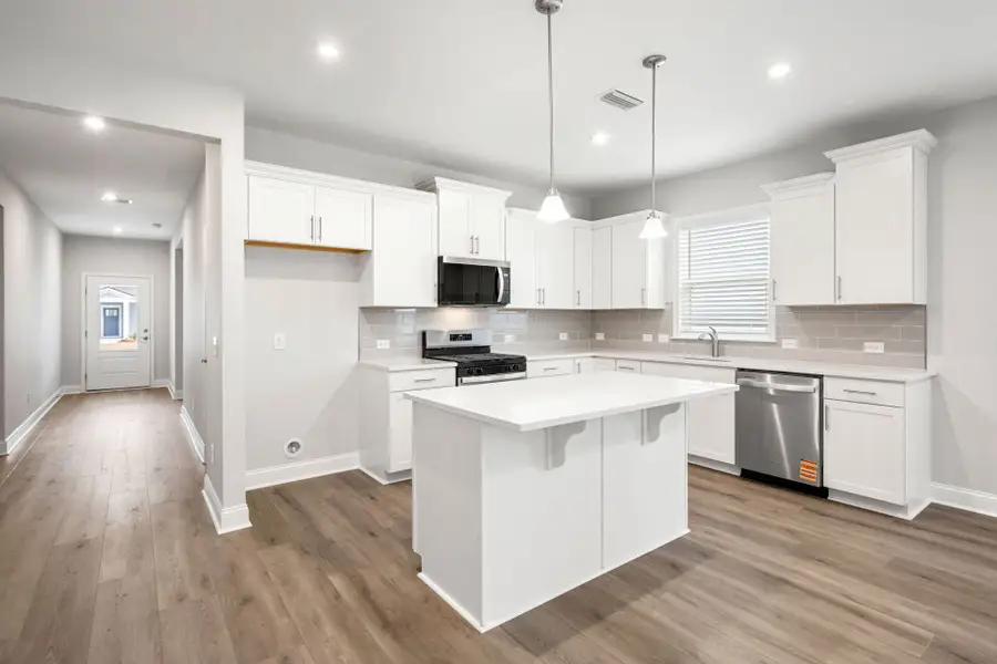 Furnished interior view inside a new home in Salem Bay, Beaufort (Image 10).