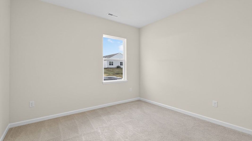 Spacious, unfurnished interior of a new home in Honeycutt Oaks, Angier (Image 30).