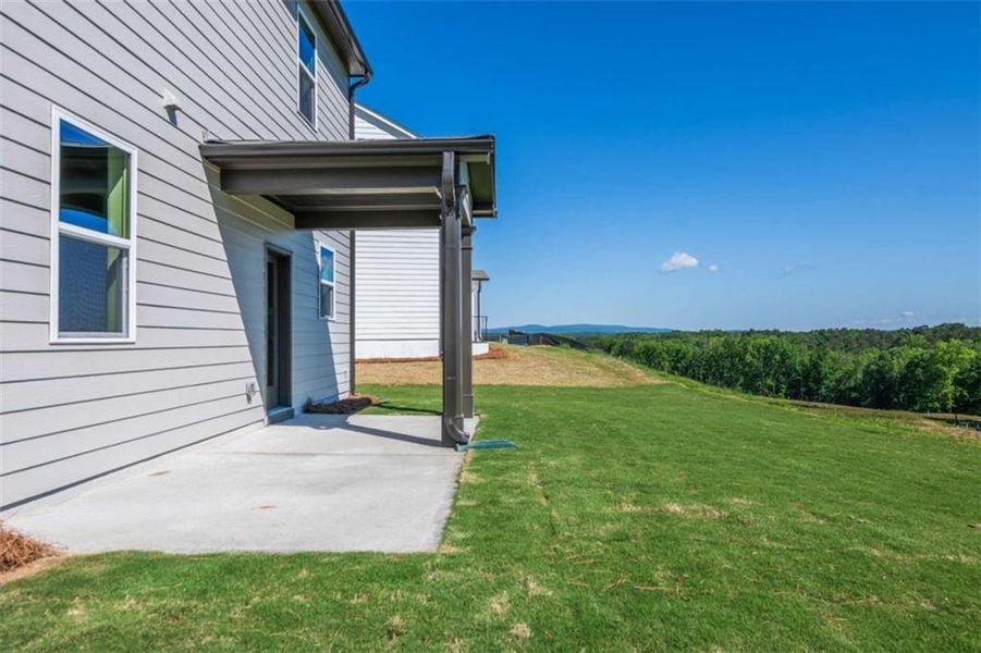 Exterior details and patio area of a home in Cambridge at Steels Bridge, Canton (Image 22).