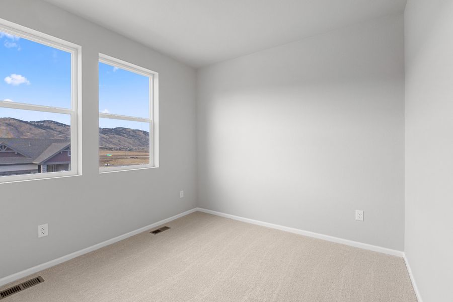 Spacious, unfurnished interior of a new home in The Manors Collection at Golden Overlook, Golden (Image 20).