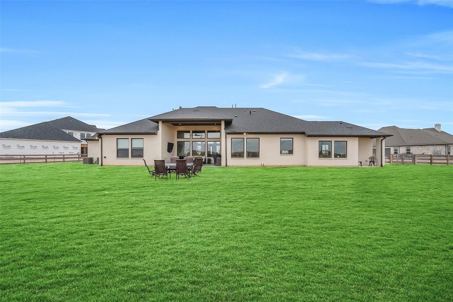 Exterior details and patio area of a home in Lakeview, Waller (Image 23).