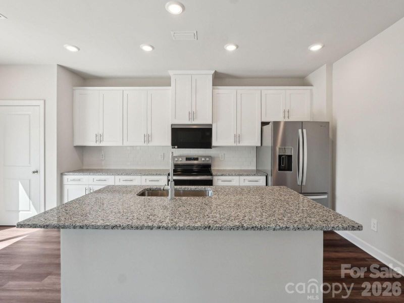 Photo is not of the actual home, but is an inspirational photo of builder’s model home and may depict options, furnishings, and/or decorator features that are not included