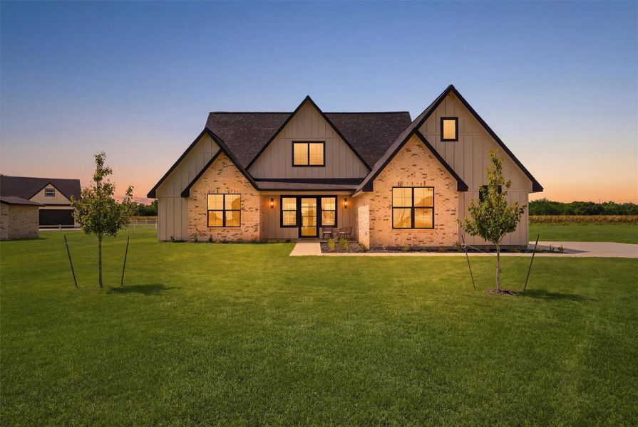 Front exterior of a new home in , Sealy, TX, highlighting curb appeal (Image 2). Front exterior of a new home in , Sealy, TX, highlighting curb appeal (Image 2).