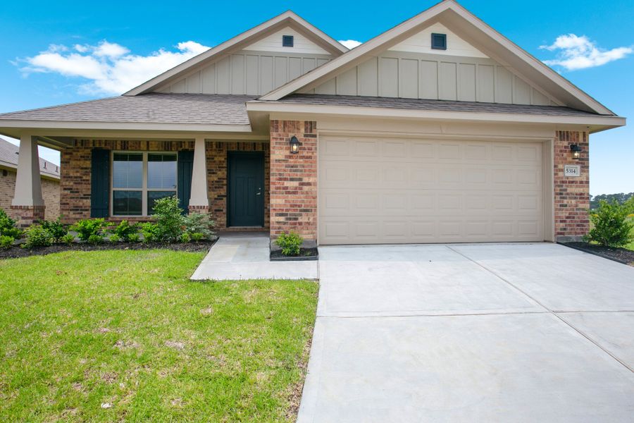 Front exterior of a new home in Bayou Maison, Texas City, TX, highlighting curb appeal (Image 2).