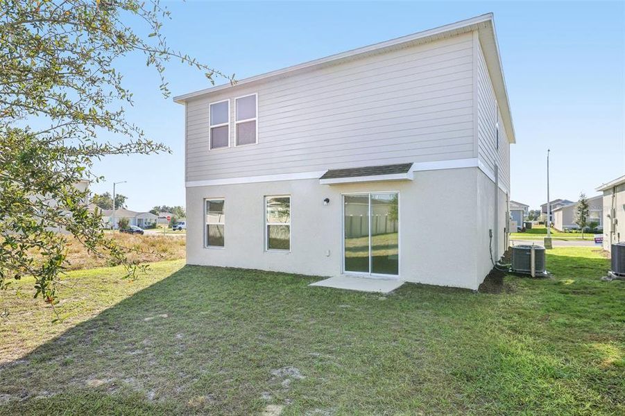 Exterior details and patio area of a home in The Reserve at Bradbury Creek, Haines City (Image 4).