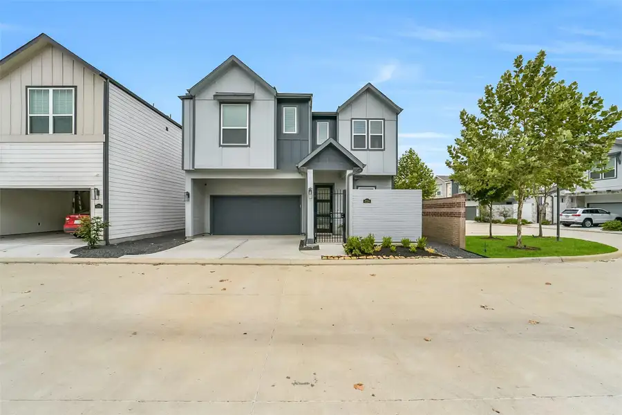 Front exterior of a new home in , Houston, TX, highlighting curb appeal (Image 21).