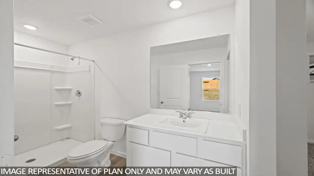 Furnished interior view inside a new home in Sunterra, Katy (Image 7).