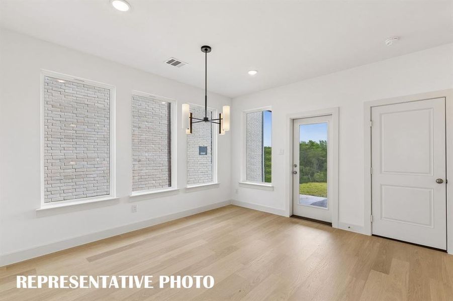 Whether it's lively dinner parties or cozy family gatherings, this dining room fits all occasions!  REPRESENTATIVE PHOTO