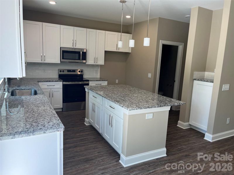 Furnished interior view inside a new home in , Statesville (Image 6).