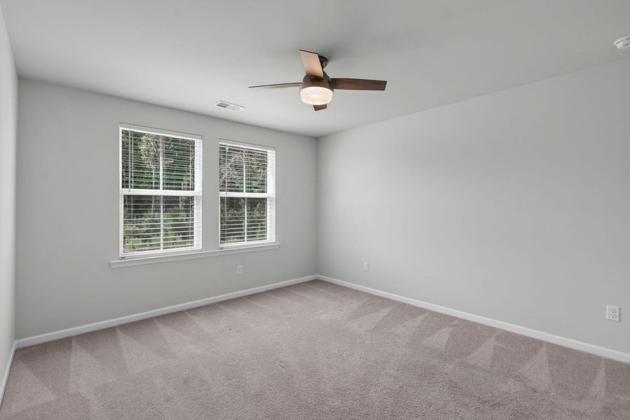 Spacious, unfurnished interior of a new home in Sweetgrass at Summers Corner, Summerville (Image 52).