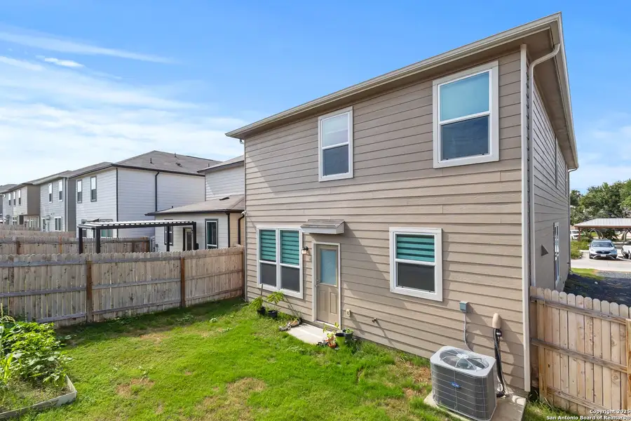 Exterior details and patio area of a home in Cove at Westover Hills, San Antonio (Image 3).