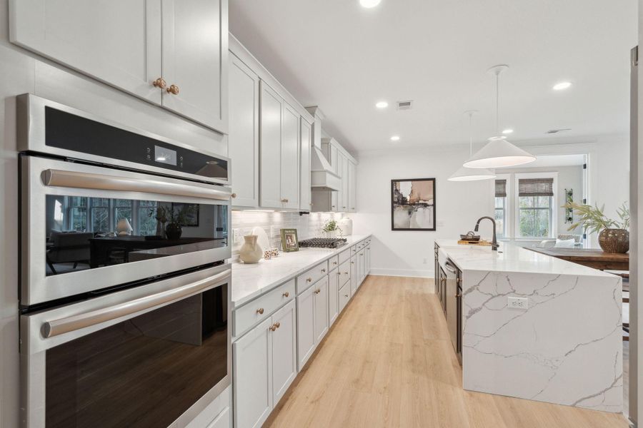 Furnished interior view inside a new home in Tidewater at Lakes of Cane Bay, Summerville (Image 29).
