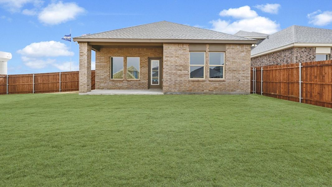 Exterior details and patio area of a home in Yarbrough Farms, Pilot Point (Image 2). Exterior details and patio area of a home in Yarbrough Farms, Pilot Point (Image 2).