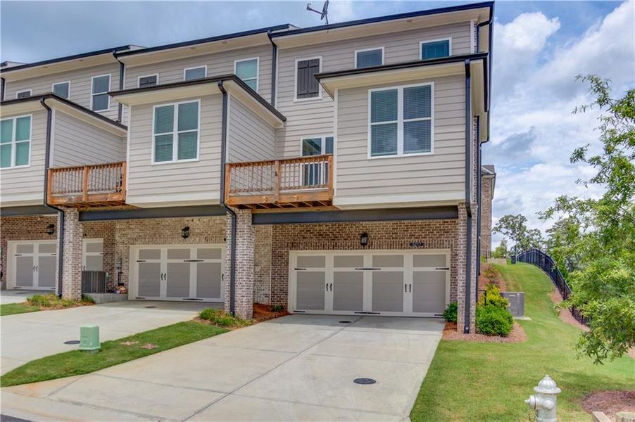 Front exterior of a new home in , Buford, GA, highlighting curb appeal (Image 28). Front exterior of a new home in , Buford, GA, highlighting curb appeal (Image 28).