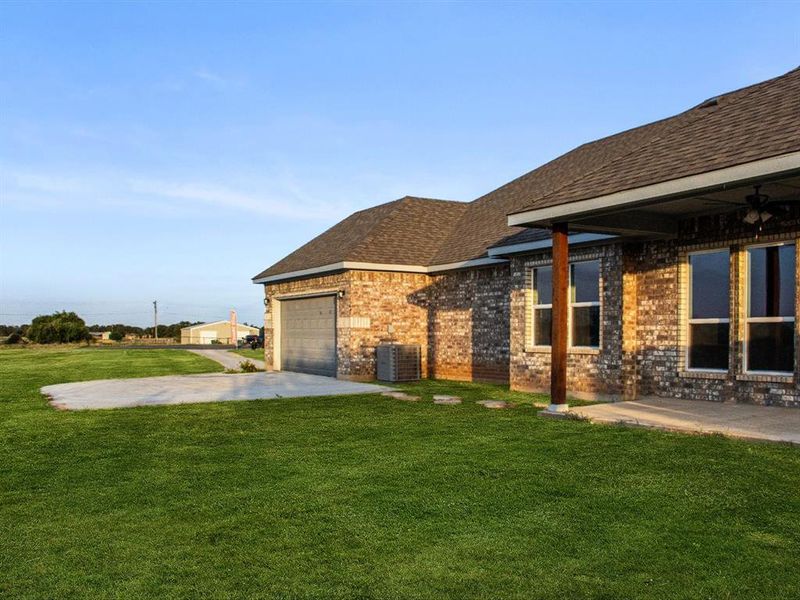 Front exterior of a new home in , Springtown, TX, highlighting curb appeal (Image 20).