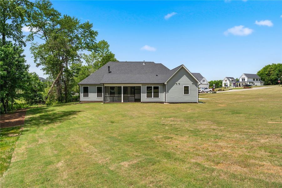 A well-maintained lawn extends from this residence