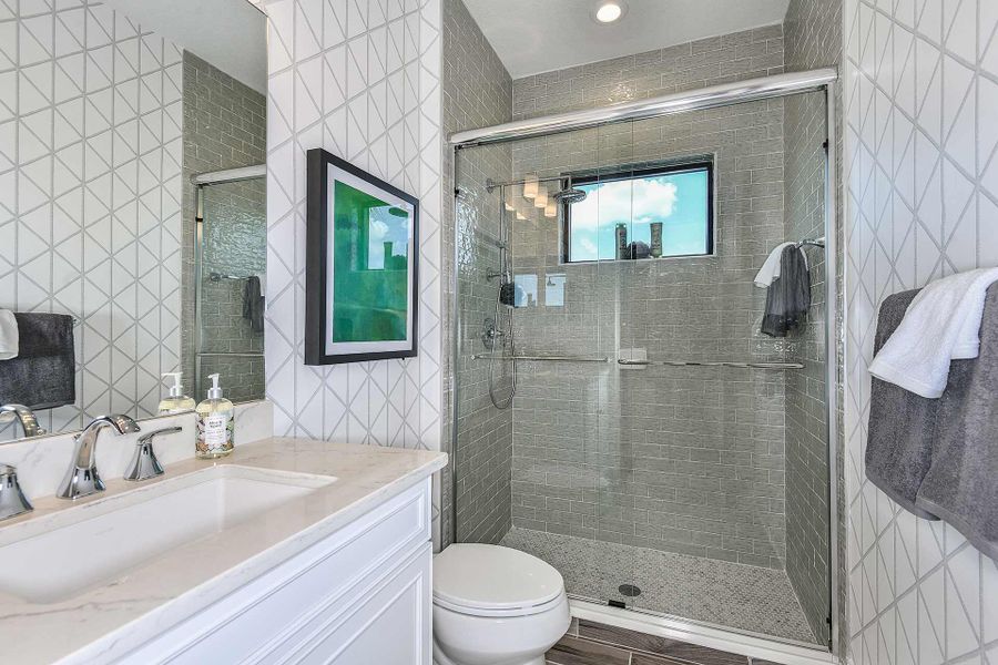 Furnished interior view inside a new home in Boca Royale Golf & Country Club at Wellen Park, Englewood (Image 10).