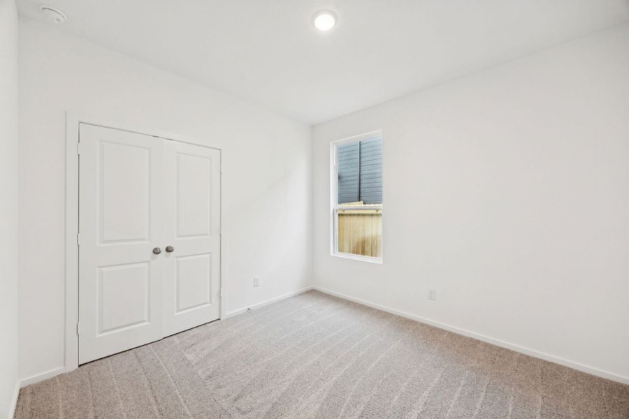 Representative unfurnished interior of a home built from the Beeville by Pulte Homes in Saddleback at Santa Rita Ranch, Liberty Hill (Image 19).