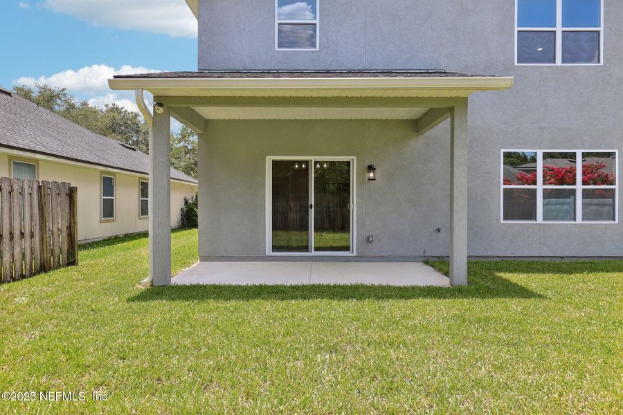 Front exterior of a new home in , Orange Park, FL, highlighting curb appeal (Image 2). Front exterior of a new home in , Orange Park, FL, highlighting curb appeal (Image 2).