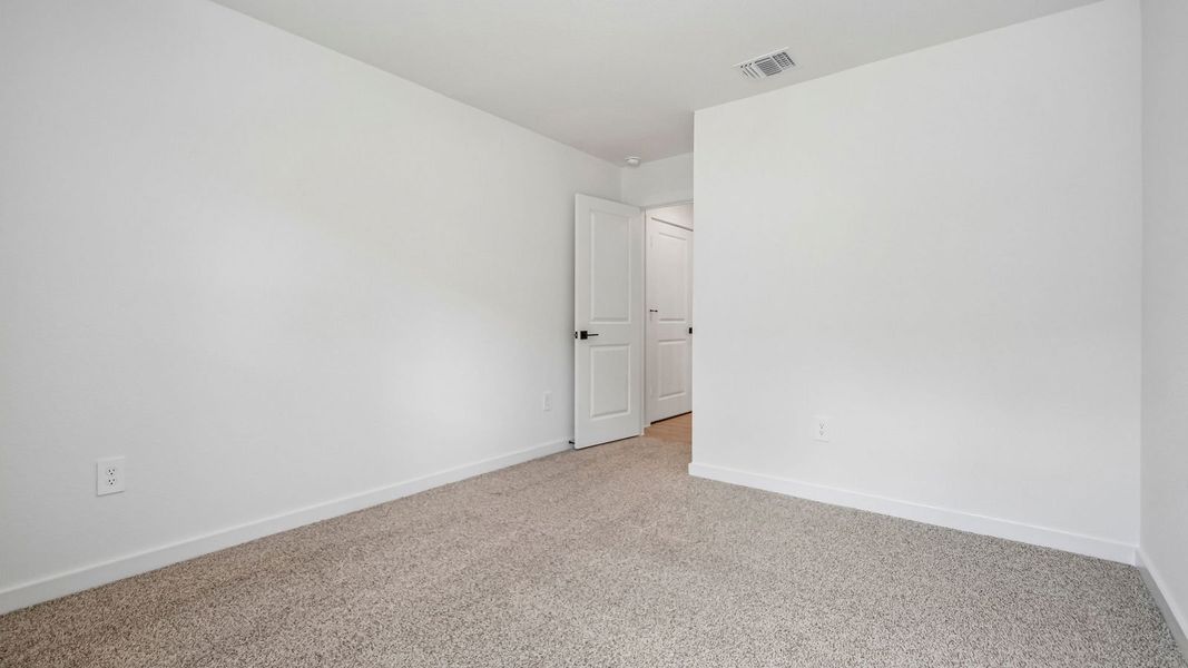 Spacious, unfurnished interior of a new home in Trails at Wildhorse, Austin (Image 27).