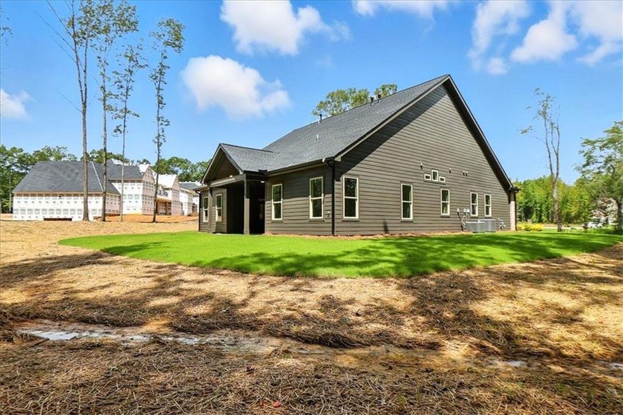 Front exterior of a new home in , Winder, GA, highlighting curb appeal (Image 26).