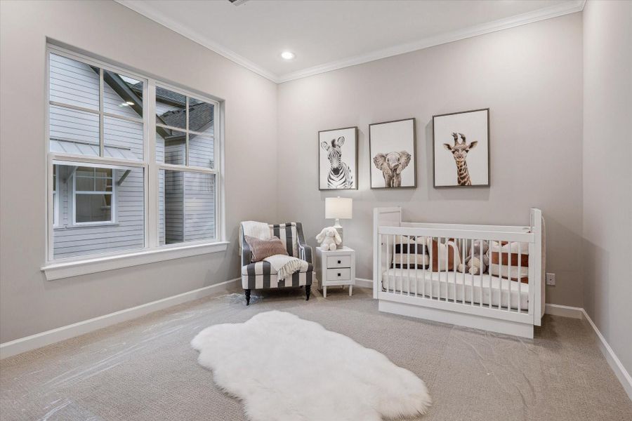 Bedroom #2 on the third floor - offers en-suite bath, luxury carpet and recessed lighting.