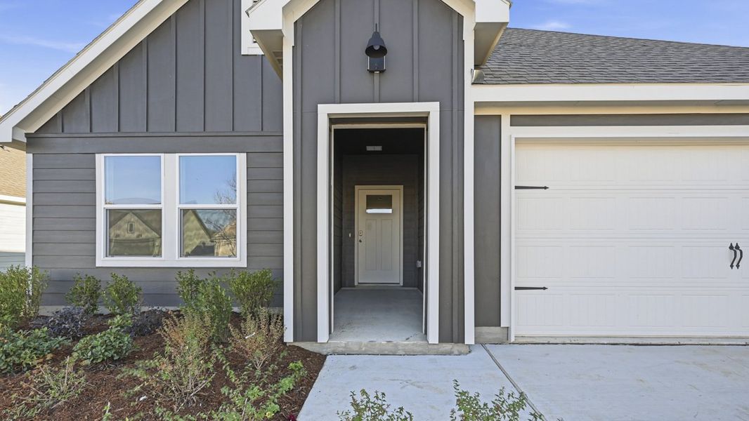 Exterior details and patio area of a home in Windrose, Pilot Point (Image 2).