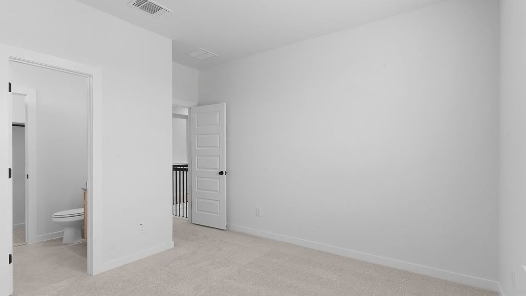 Representative unfurnished interior of a home built from the Acadia by Chesmar Homes in Crescent Bluff, Georgetown (Image 19).