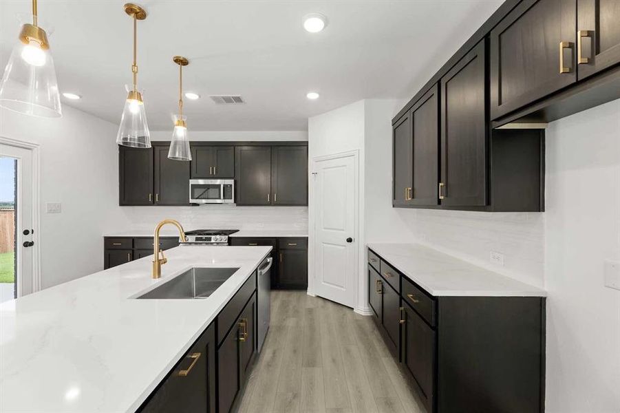 Furnished interior view inside a new home in Creekview Fossil Ridge, Pilot Point (Image 6).