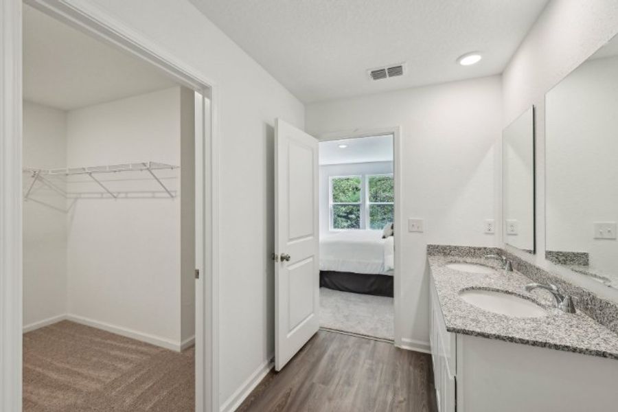 A bathroom with a sink and a bathtub.