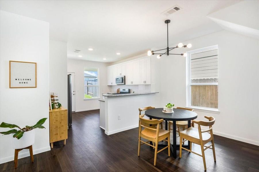 Kitchen and dining room with breakfast bar. Kitchen and dining room with breakfast bar.