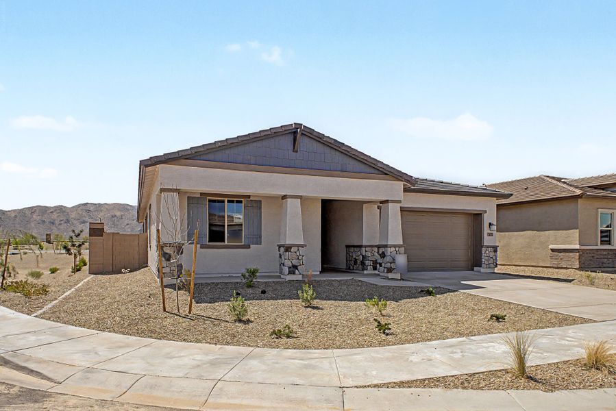 Front exterior of a new home in Frontera, Surprise, AZ, highlighting curb appeal (Image 2). Front exterior of a new home in Frontera, Surprise, AZ, highlighting curb appeal (Image 2).