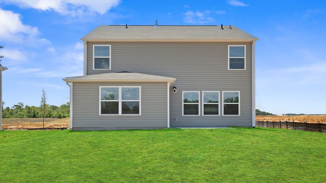 Front exterior of a new home in Harrier Point, Woodruff, SC, highlighting curb appeal (Image 18). Front exterior of a new home in Harrier Point, Woodruff, SC, highlighting curb appeal (Image 18).