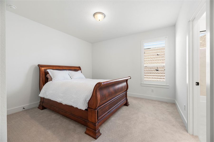 Furnished interior view inside a new home in Bridgeland, Cypress (Image 30).
