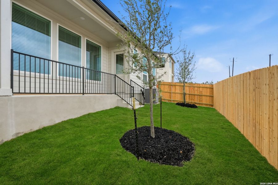 Exterior details and patio area of a home in Prominence, San Antonio (Image 23).