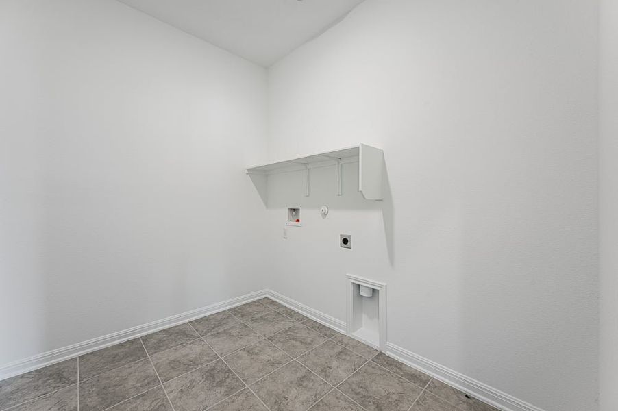 Representative unfurnished interior of a home built from the Mockingbird by Taylor Morrison in Longview 50s, Del Valle (Image 20).
