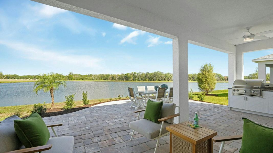 Exterior details and patio area of a home in Wildleaf Real Estate and Homes for Sale in Parrish, FL - Neal Communities, Parrish (Image 2).
