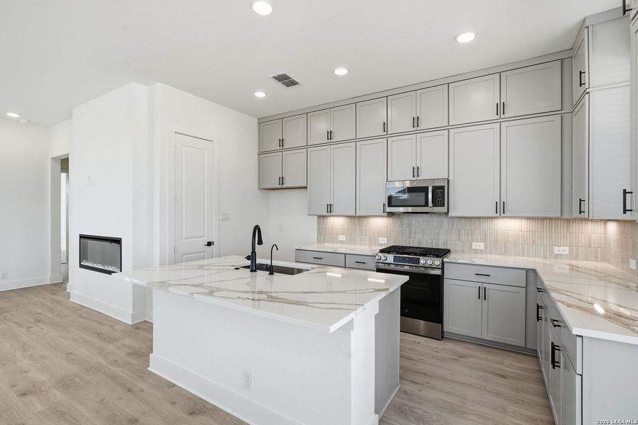 Furnished interior view inside a new home in Prominence, San Antonio (Image 12).