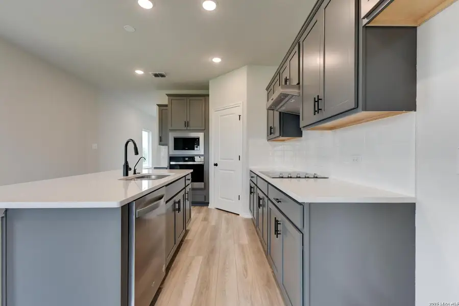 Furnished interior view inside a new home in Hennersby Hollow, San Antonio (Image 7).